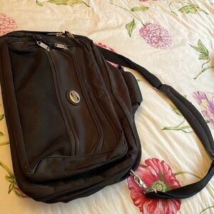 American Tourister black carryon bag with shoulder strap